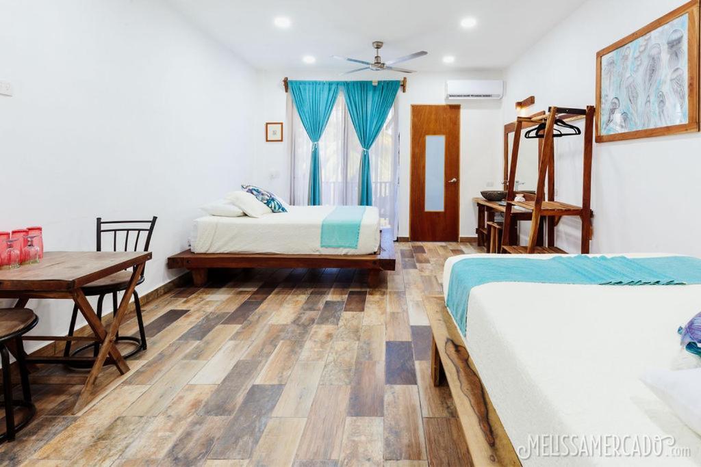Ah Muzenkab Hotel El Cuyo Luaran gambar